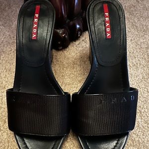 Black Prada wedge heels